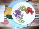 A plate of food with vegetables on it